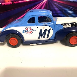 1:24 scale model of a Old Time Modified Race Car marked Fireball - doubles as a bank with key. Clean and pristine. Ships free inside the USA image 1