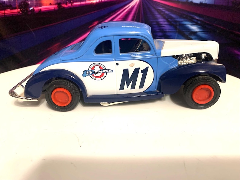 1:24 scale model of a Old Time Modified Race Car marked Fireball - doubles as a bank with key. Clean and pristine. Ships free inside the USA image 1