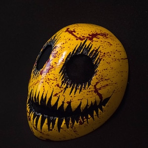 Smile mask with blood splatter