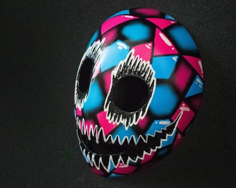 Máscara de sonrisa en forma de mosaico