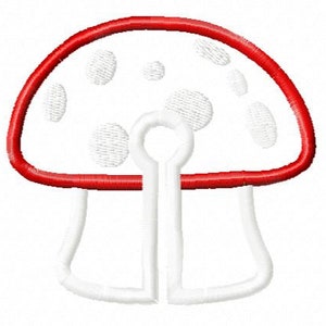 May include: White mushroom with red dots and a red cap, outlined in white. The mushroom has a white stem.