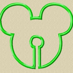 May include: Green outline of a Mickey Mouse head with a keyhole in the center.
