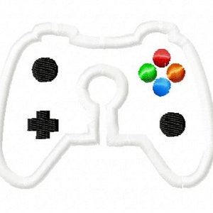 May include: White video game controller with black buttons and a colorful button cluster in the center.