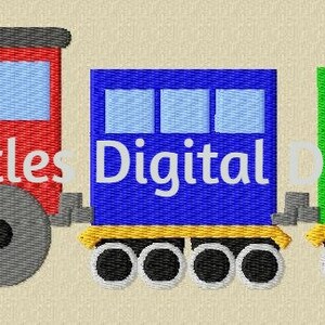 May include: A red, blue, and green toy train with three cars. The engine car has a black chimney and wheels. The middle car has three windows and the last car has three windows. The text "My Littles Digital Designs." is printed on the train.