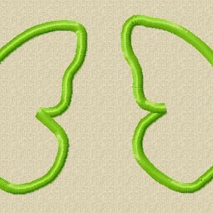 May include: Two green outline butterfly shapes on a beige background.