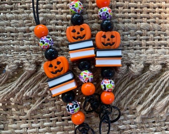Books and Pumpkin Jack-O-Lantern stretchy, breakaway, silicone beaded lanyard for teachers, admin, for badge, ID, keys, whistle!