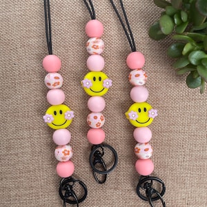 Pink Retro Boho Smiley Face with daisies on cheeks! Teacher Lanyard for student teacher, school psychologist, counselor, for keys and badge!