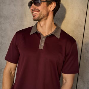 Men's Polo Shirt PDF Sewing Pattern | Sizes S–5XL Sew a classic men's polo shirt with a sharp contrast collar and placket, short sleeves, and a comfortable, true-to-size fit. This everyday essential works in soft jersey or pique knit for a polished, ready-to-wear look — perfect for building a custom wardrobe or sewing thoughtful handmade gifts.

With a full step-by-step video tutorial included, you'll get a clean, professional finish — even as a beginner.