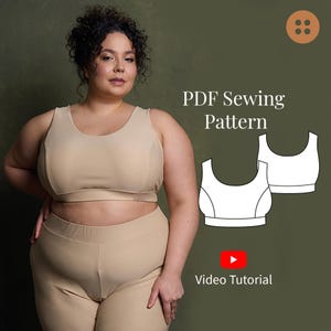 May include: A woman wearing a beige sports bra and matching leggings. The image includes a diagram of the bra and the text "PDF Sewing Pattern" and "Video Tutorial". The background is a solid olive green.