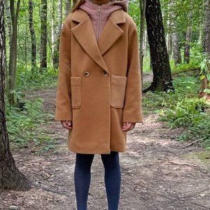 Kids Coat PDF Sewing Pattern – Sizes 7-14 Years + Video Sewing Tutorial

Sew a stylish and warm coat for your child with this easy-to-follow Kids Coat PDF Sewing Pattern! Designed for children aged 7 to 14 years, this pattern includes all necessary sizes and comes with a step-by-step video tutorial, making it beginner-friendly. Perfect for cozy outerwear made from wool, softshell, or rainproof fabrics. Print at home (A4/US Letter) or in A0 format.