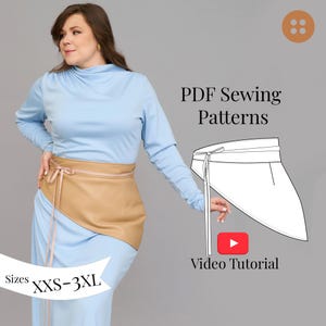 May include: A woman wearing a light blue dress with a tan belt. The image includes text that reads "PDF Sewing Patterns", "Video Tutorial", and "Sizes XXS-3XL". A button is in the upper right corner.
