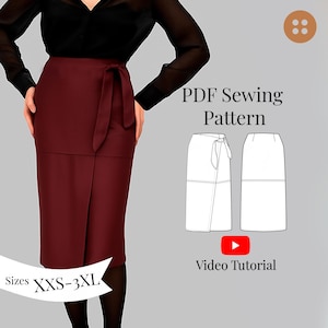 Könnte beinhalten: Ein burgunderfarbener Wickelrock mit passendem Bindegürtel, kombiniert mit einem schwarzen Oberteil. Das Bild enthält ein PDF-Schnittmuster und einen Link zum Video-Tutorial. Verfügbare Größen sind XXS-3XL.