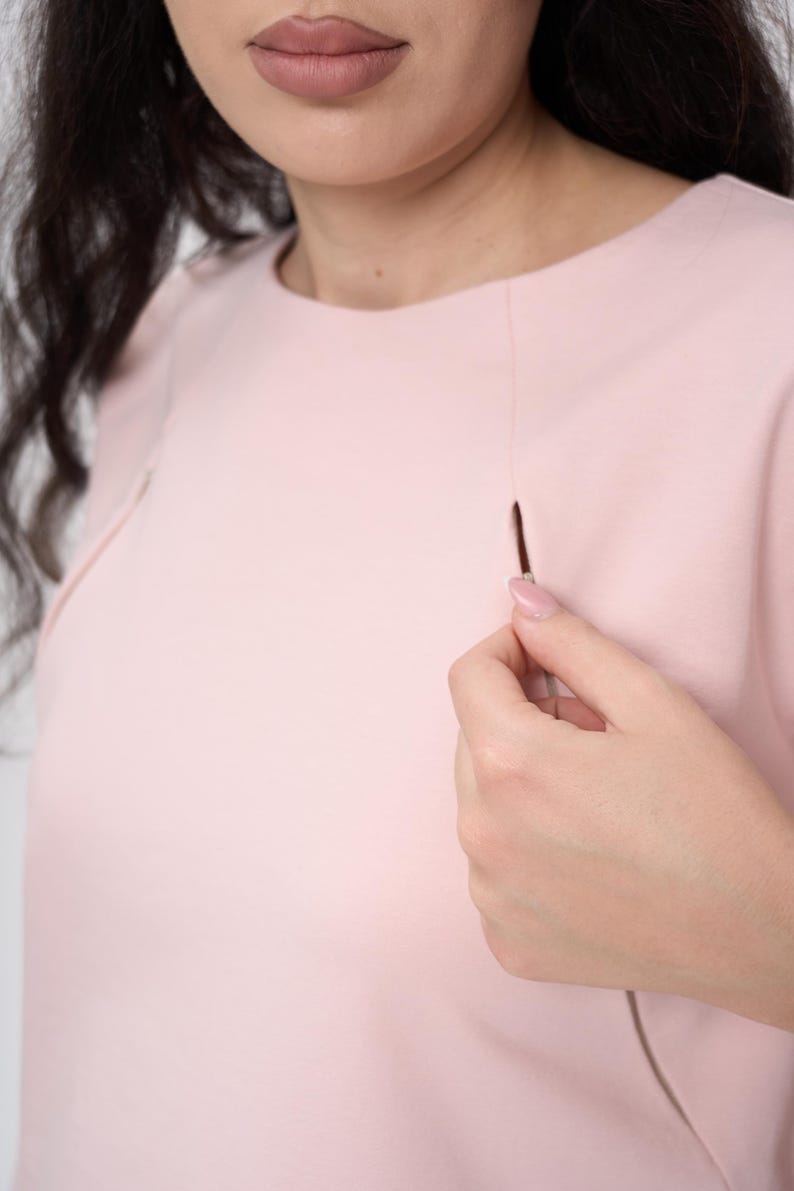 Maternity Nursing Sweatshirt Sewing Pattern PDF | Raglan Sleeve Nursing Top S-3XL | PDF + VIDEO tutorial.
 Sew a soft, relaxed raglan-sleeve sweatshirt with built-in zip nursing access — comfortable enough to wear throughout pregnancy and practical enough to keep using after baby arrives. A true two-in-one wardrobe staple that grows with you.

With a full step-by-step video tutorial included, you'll get a clean, professional finish — even as a beginner.