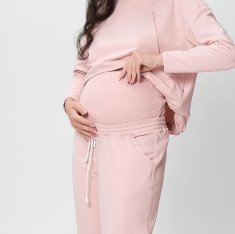 Maternity Sewing Pattern PDF | Nursing Top + Pregnancy Pants Bundle S-3XL | PDF + Video Tutorial 

Maternity Bundle PDF Sewing Pattern | Sizes S–3XL Sew a complete maternity set — a relaxed raglan-sleeve top with nursing-friendly seam access, paired with comfortable elastic drawstring pregnancy pants. Designed to grow with your bump and stay comfortable through every stage, this soft, easy-fit set is perfect for everyday wear, lounging, or nursing after baby arrives.