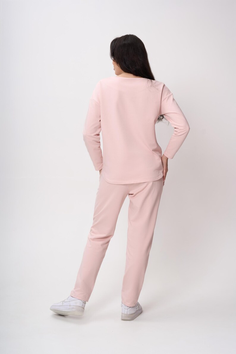 Maternity Nursing Sweatshirt Sewing Pattern PDF | Raglan Sleeve Nursing Top S-3XL | PDF + VIDEO tutorial.
 Sew a soft, relaxed raglan-sleeve sweatshirt with built-in zip nursing access — comfortable enough to wear throughout pregnancy and practical enough to keep using after baby arrives. A true two-in-one wardrobe staple that grows with you.

With a full step-by-step video tutorial included, you'll get a clean, professional finish — even as a beginner.