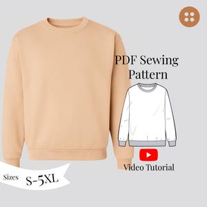 Peut inclure: Un sweat-shirt beige à col rond avec une illustration correspondante du patron de couture. Le texte "PDF Sewing Pattern" et "Video Tutorial" sont affichés. Tailles disponibles : S-5XL.