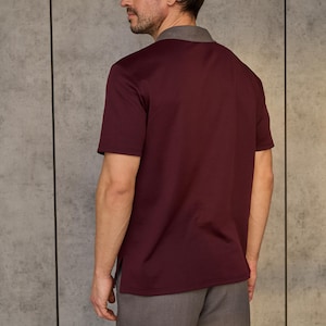 Men's Polo Shirt PDF Sewing Pattern | Sizes S–5XL Sew a classic men's polo shirt with a sharp contrast collar and placket, short sleeves, and a comfortable, true-to-size fit. This everyday essential works in soft jersey or pique knit for a polished, ready-to-wear look — perfect for building a custom wardrobe or sewing thoughtful handmade gifts.

With a full step-by-step video tutorial included, you'll get a clean, professional finish — even as a beginner.