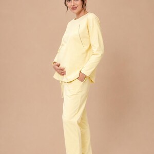 Maternity Nursing Sweatshirt Sewing Pattern PDF | Raglan Sleeve Nursing Top S-3XL | PDF + VIDEO tutorial.
 Sew a soft, relaxed raglan-sleeve sweatshirt with built-in zip nursing access — comfortable enough to wear throughout pregnancy and practical enough to keep using after baby arrives. A true two-in-one wardrobe staple that grows with you.

With a full step-by-step video tutorial included, you'll get a clean, professional finish — even as a beginner.