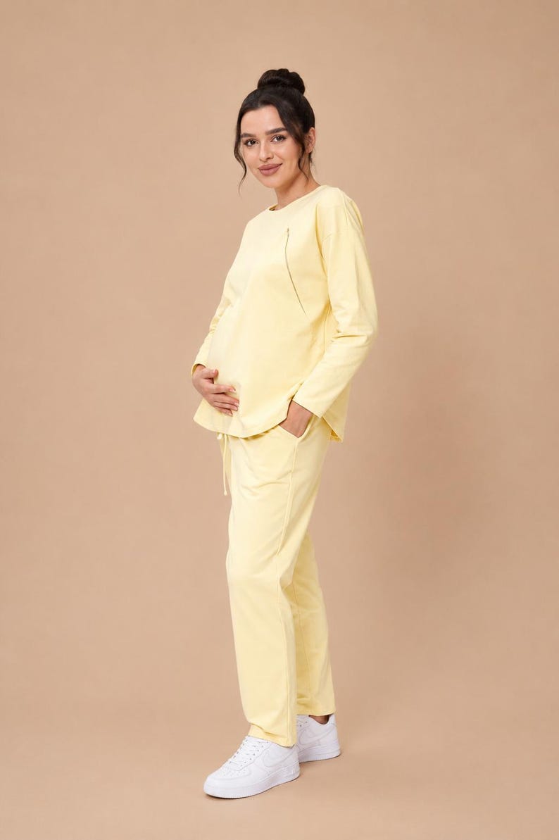 Maternity Nursing Sweatshirt Sewing Pattern PDF | Raglan Sleeve Nursing Top S-3XL | PDF + VIDEO tutorial.
 Sew a soft, relaxed raglan-sleeve sweatshirt with built-in zip nursing access — comfortable enough to wear throughout pregnancy and practical enough to keep using after baby arrives. A true two-in-one wardrobe staple that grows with you.

With a full step-by-step video tutorial included, you'll get a clean, professional finish — even as a beginner.