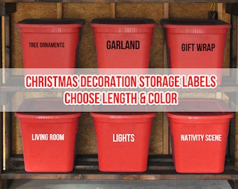 May include: Red storage containers labelled for Christmas decorations, such as "Tree Ornaments," "Garland," and "Gift Wrap." The image also displays the text "Christmas Decoration Storage Labels, Choose Length & Colour."