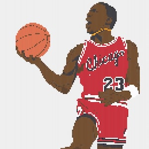 Puede incluir: Ilustración de un jugador de baloncesto con una camiseta roja de los Chicago Bulls con el número 23. El jugador sostiene un balón de baloncesto naranja y lleva zapatillas rojas y negras. La palabra "Chicago" está en la camiseta.
