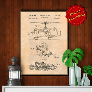 Puede incluir: Un dibujo técnico vintage en blanco y negro de una patente de helicóptero. El dibujo muestra el helicóptero en vuelo y un diagrama detallado de sus componentes internos. El número de patente es 3.474.819 y la fecha es el 28 de octubre de 1969. El título de la patente es "CH-HELICOPTER".
