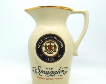 Vintage "Old Smuggler" Scotch Whisky promotional water pitcher, W.A. Taylor & Company