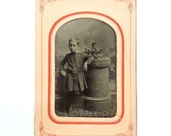 Vintage Tintype of Young Child Leaning on Post/Pedestal in original paper frame