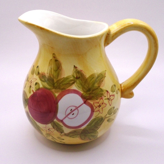 Vintage Rustic Yellow Pitcher with Painted Leaves and Sliced Apple