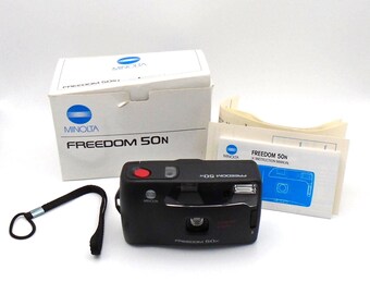 1990's Minolta Freedom 50N, fully automatic, reusable 35mm point-and-shoot film camera