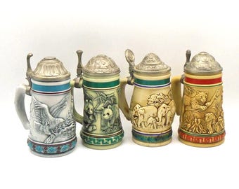 Set of 4 Avon "Endangered Species Collection" Lidded Steins, Jaguars, Koala Bears, Bald Eagles, Elephants, Made in Brazil, Circa 1990-1991