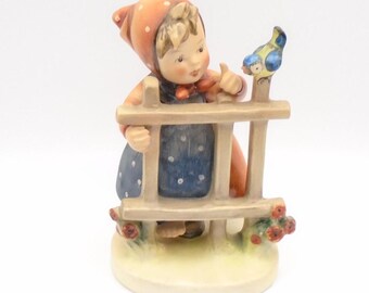 Goebel Hummel "Signs of Spring" Little Girl Leaning on Fence with Bluebird, One Shoe On, Hummel 203 TMK 2, Made in  Germany, Circa 1950's
