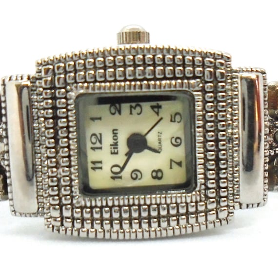 Eikon top quartz watch