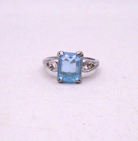 Vintage Avon Signed Silver Tone Ring with Emerald Cut Blue Stone, Circa 1970's