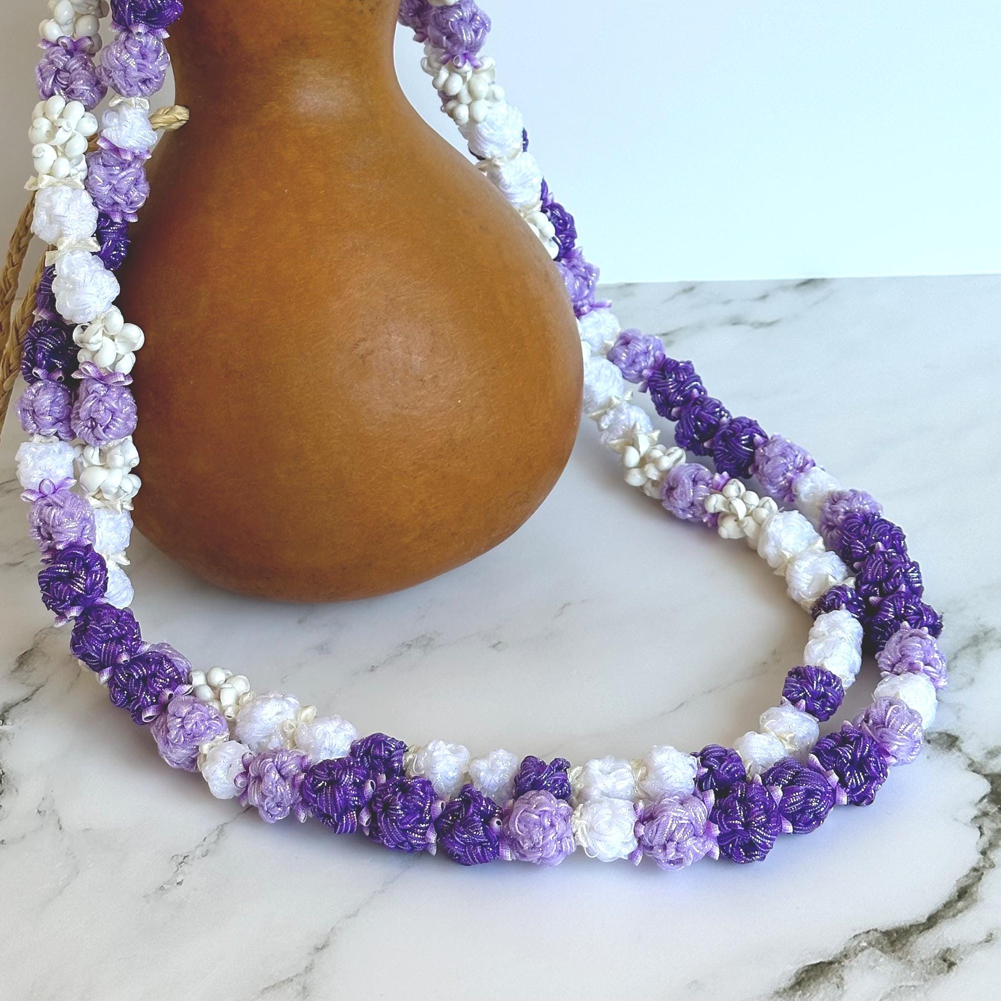 Ribbon Lei - 2-strand Purple and White Crown Flower With Mongo