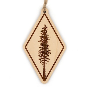 May include: A wooden diamond-shaped ornament with a laser-cut design of a tall, slender evergreen tree.