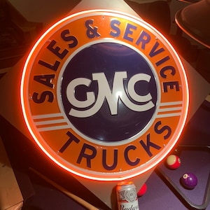 GMC truck, Chevy, 25” Huge  metal sign. Comes with a  Neon sign  wall frame you  can pick Red, Blue Green or Orange led.