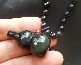 ウムクルム山産の大きな虹色のレクライ石の魔法のペンダント / 強力な