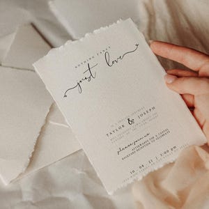 May include: A wedding invitation with a rustic, handmade paper texture. The invitation features the text "NOTHING FANCY just love" in a handwritten font. The invitation details a private ceremony for Taylor & Joseph on October 8th, 2021 at 5:00 PM. The address is 1234 Main Street, Las Vegas, NV 12345.