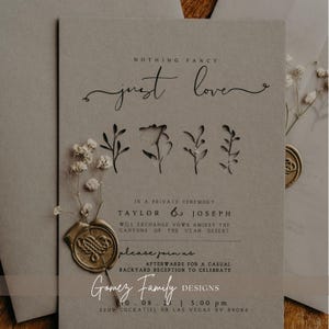 May include: A wedding invitation with a rustic aesthetic. The invitation features a brown paper background with a wax seal and the text "NOTHING FANCY just love" in a handwritten font. The invitation also includes the names "TAYLOR & JOSEPH" and the text "IN A PRIVATE CEREMONY WILL EXCHANGE VOWS AMIDST THE CANYONS OF THE UTAH DESERT please join us AFTERWARDS FOR A CASUAL BACKYARD RECEPTION TO CELEBRATE Gomez Family DESIGNS 10.08.24 5:00 pm 2209 COCKATIEL DR LAS VEGAS NV 89084".