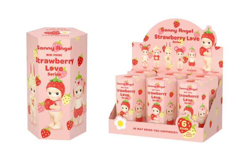 May include: A pink hexagonal box and a matching display stand featuring the Sonny Angel Strawberry Love Series. The packaging is decorated with strawberry illustrations and text that reads Sonny Angel Mini Figure Strawberry Love Series.