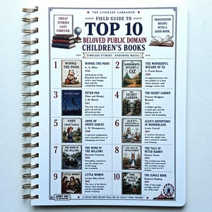May include: A spiral-bound notebook with a printed page titled "Field Guide to Top 10 Beloved Public Domain Children's Books." The guide lists classic children's books with illustrations and text. The notebook has a gold spiral binding.