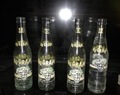 4 vintage Nugrape soda bottles
