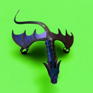 May include: A black leather dragon costume with purple wings. The dragon has a long tail and a pointed head.