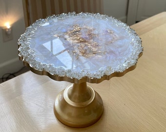 Iridescent white opal tray stand with gold pedestal base, decorative centerpiece display, custom tray with reflective glass rim, handmade