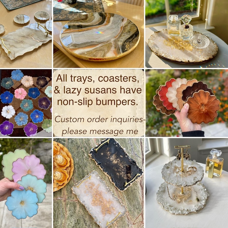 May include: A selection of decorative trays, coasters, and lazy susans. The items are in various shapes and colours, including round, rectangular, and flower-shaped designs. The text in the image reads: "All trays, coasters, & lazy susans have non-slip bumpers. Custom order inquiries- please message me."
