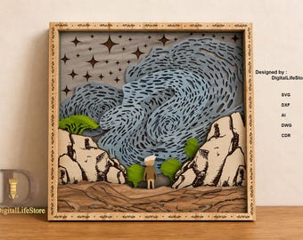 May include: A layered wooden art piece depicting a landscape with a figure, rocks, and swirling blue shapes, possibly representing a starry night. The frame is light brown, and the artwork includes green and brown elements.