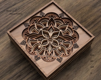 May include: A wooden wall art piece with a layered mandala design in shades of brown and orange. The mandala is framed in a square wooden frame. The text "Designed by: DigitalLifeStore" is visible in the top left corner of the image. The text "SVG, DXF, CDR, AI" is visible in the bottom right corner of the image.