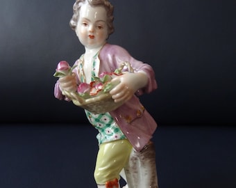 Meissen porcelain figure, gardener child with flower basket