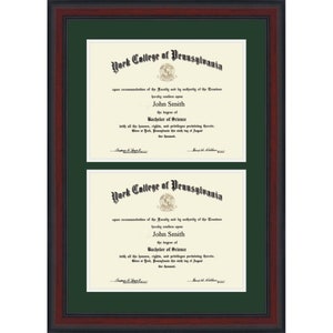 May include: A framed diploma from York College of Pennsylvania, with a white background and black text. The diploma is for John Smith, Bachelor of Science.
